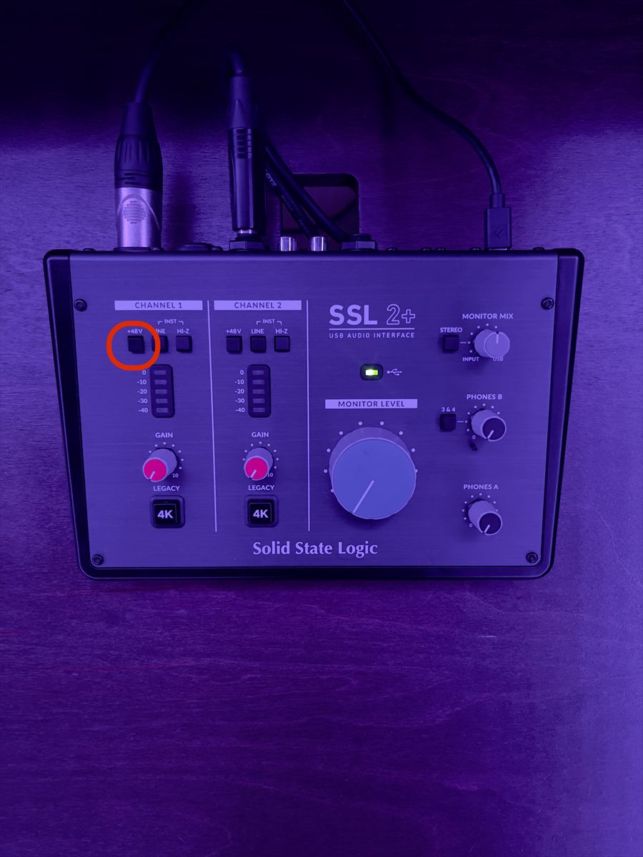 The +48V phantom power button circled on channel 1 of the SSL interface