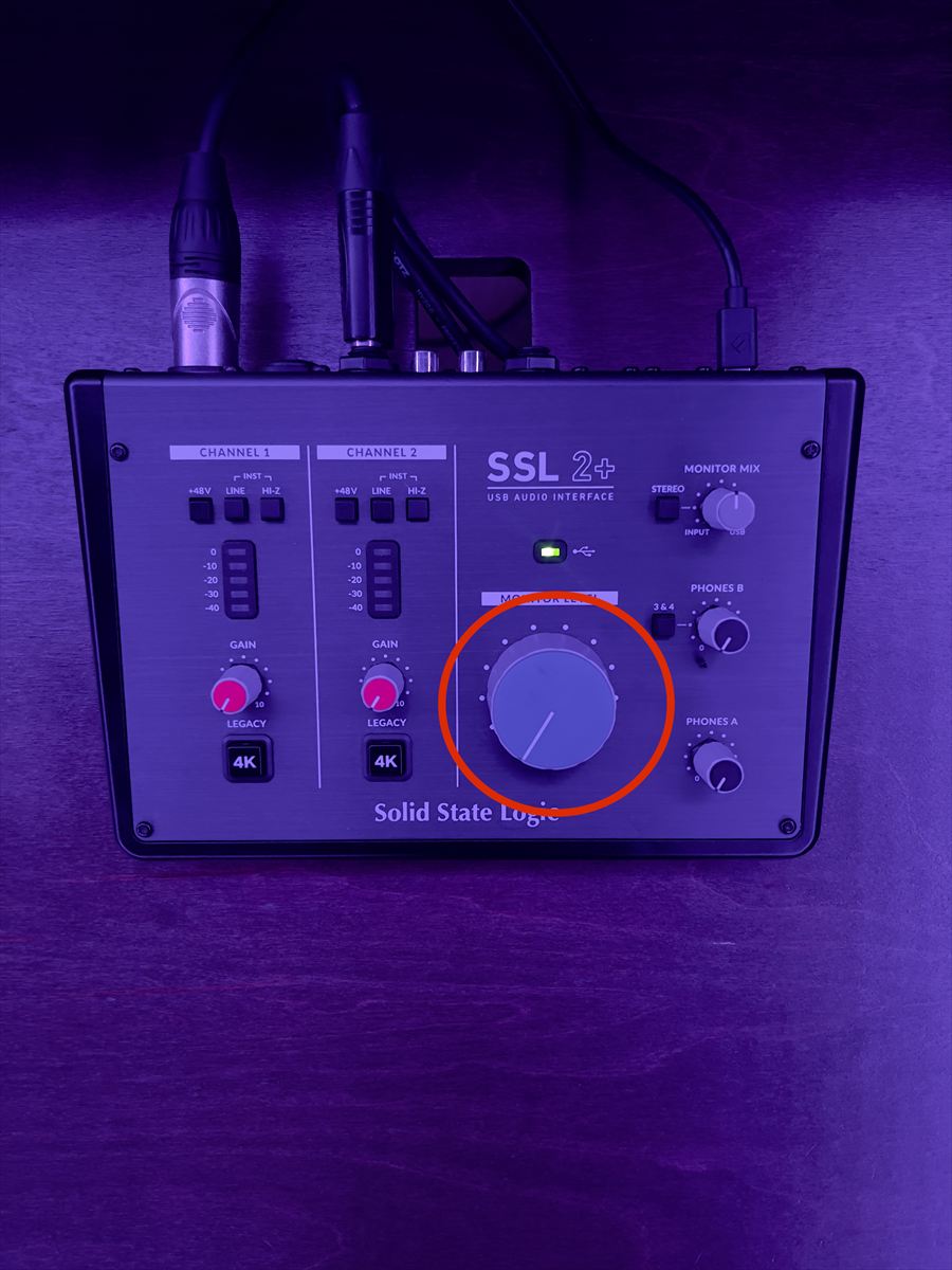 The Monitor Level dial circled on the SSL interface